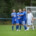 Ü40-Spieler von Blau-Weiß Mahlsdorf/Waldesruh feiern gemeinsam auf dem Spielfeld
